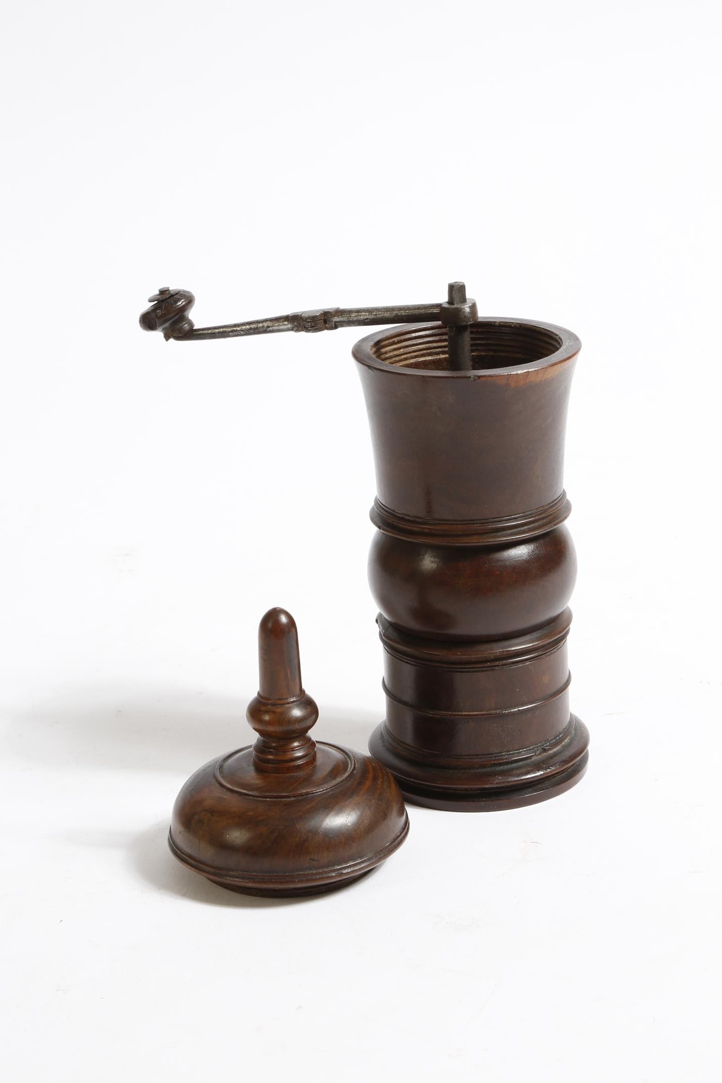 A George III treen lignum vitae coffee grinder, the lid with a stylised acorn finial, above a ring - Image 2 of 2
