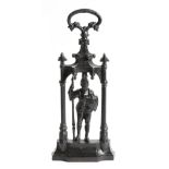 A Victorian cast iron doorstop by Coalbrookdale, in the form of a knight under an arch, with a
