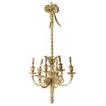 A late 19th century French ormolu six-light chandelier in Louis XVI style, decorated with ribbons