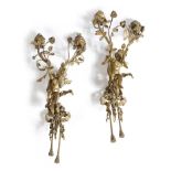 A pair of French gilt bronze figural twin-light wall appliques, with a ribbon tied tasselled