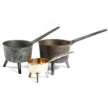 Three 18th century bronze and bell metal skillets by Warner, the handles cast 'WARNER 5P', 'WARNER