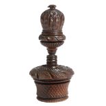 A George III treen coquilla nut and lignum vitae table nutmeg grater, turned and carved, with a