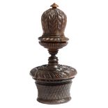 A George III treen coquilla nut and lignum vitae table nutmeg grater, turned and carved, with a