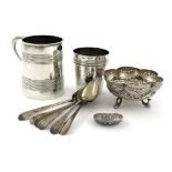 A mixed lot of silver items, comprising: a Victorian mug, London 1877, tapering circular form, a