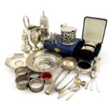 A mixed lot of silver items, comprising: a Victorian mustard pot, London 1857, circular form,