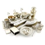 A mixed lot of silver items, comprising: a late-Victorian sauce boat, by Charles Stuart Harris,