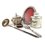 λA mixed lot of silver items, comprising: a late-Victorian tea caddy, by Carrington and Co, London