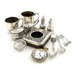 A mixed lot of silver items, various dates and makers, comprising: two christening mugs, a pair of