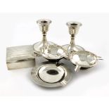 A mixed lot of silver items, various dates and makers, comprising: a pair of dwarf candlesticks,