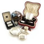 A mixed lot of silver items, comprising: a silver-gilt mug, London 1894, a cased christening bowl