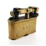 A 9ct gold Dunhill lift arm short rectangular cigarette lighter, the arm signed Dunhill and REG