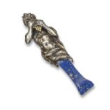 A silver and lapis lazuli desk seal, modelled as Pan playing the pipes, the lapis lazuli pedestal