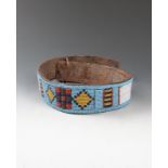 A Northern Plains beaded belt leather and coloured glass and faceted metal beads, with a turquoise