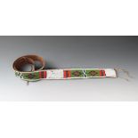 A Northern Plains beaded belt leather horse harness and coloured glass beads, with geometric