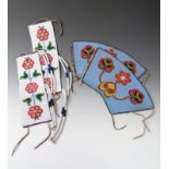 A pair of Blackfoot beaded armbands rectangular canvas with applique glass beads on a white ground