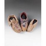 Three North American moccasins buckskin, coloured glass beads, cloth and quill, including a Sioux