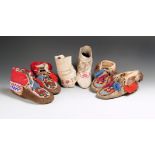 Three pair of North American moccasins buckskin, cloth, wool, cotton, glass beads and fur, including