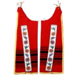 A pair of Ojibwe leggings blanket cloth, canvas, coloured glass beads, hide and ribbon, the