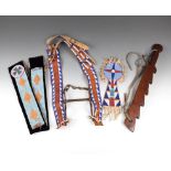 A Crow horse forehead ornament hide and glass beads, of keyhole shape, the top with a four point