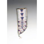 A Sioux knife sheath buckskin, rawhide and coloured glass beads, with a white ground and geometric