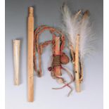 A Plains whistle bone with a beaded band and beaded medicine bag, buckskin, fur and cloth, with