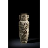 λ A massive 19th century Chinese ivory vase, the rectangular body finely and elaborately carved,