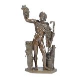 After the antique. An Italian bronze Grand Tour figure of a drunken faun, holding grapes, a