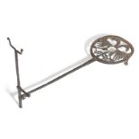 A rare 18th century wrought iron trivet, the stand worked with a double headed eagle and with an urn
