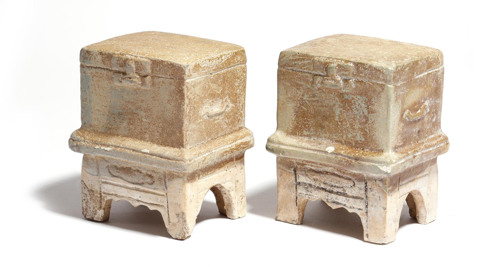 A pair of Chinese pottery models of votive chests in Han Dynasty style, partly glazed, probably Ming