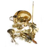 A collection of brass ware, including: a spoon with a horn bowl, a pair of candle snuffers with