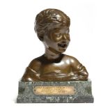 An early 20th century French bust of a boy, signed 'DONATELLO', on a green serpentine plinth with an