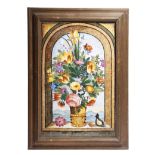An Italian maiolica panel or tile, painted with an urn of flowers on a window ledge, 39 x 25.3cm, in