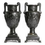 A pair of 19th century bronze Grand Tour classical urns, in the Greek style, of amphora shape,