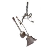 An early 19th century fire tool shovel, with a knopped stem, together with a steel basting spoon,