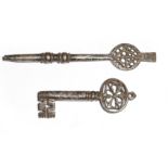 Two 16th century Italian iron keys, one Venetian with a hexafoil Gothic bow and a zigzag decorated