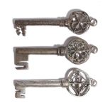 Three Italian Venetian keys, each with a pierced Gothic bow and with a ring for suspension, all with