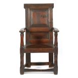 A George II Scottish pine and oak panelled back open armchair, the top rail incised with initials 'W