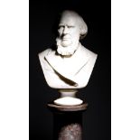 A Victorian marble bust of a bearded gentleman, wearing a jacket, on a turned socle, 73cm high, 44.