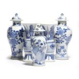 A small pair of Chinese porcelain blue and white yen-yen vases, together with a pair of blue and