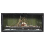 A folk art naive painted wood model of a steam ship, titled S. S. Carlton, with rigging, cotton wool