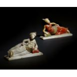 A pair of Dutch alabaster finials of reclining Turkish figures, with polychrome decoration, late