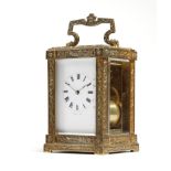 A late 19th century French gilt brass carriage clock by Bolvillier, the eight day movement with an