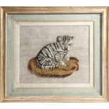 A 19th century wool and needlework picture of a cat, 20 x 25cm, later mounted in a painted and