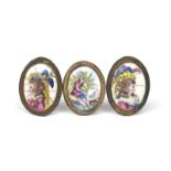 Three English enamel oval plaques c.1760-80, two decorated with the portraits of young society