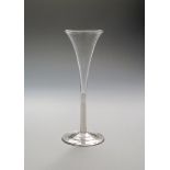 A toasting glass c.1765, with tall drawn trumpet bowl rising from a finely slender double series