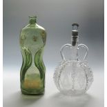 A Union decanter c.1820, the tall pinched-waist form of a pale green metal, inscribed in gilt relief