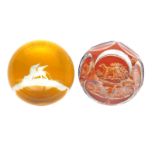 Two Bohemian glass paperweights 2nd half 19th century, one cut with the Lion of St Mark on an