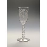 An ale glass with rare engraving c.1760, the slender ogee bowl engraved with two ears of barley