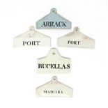 Four creamware bin labels 19th century, including Wedgwood, of coathanger form, titled 'Port', '