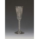An ale glass c.1760, the slender round funnel bowl engraved with hops and barley, over a mercury